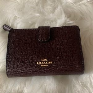Coach Leather corner zip wallet